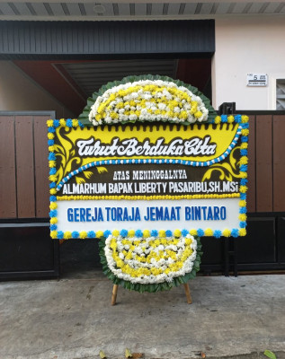 Papan Bunga Duka di Papusungan